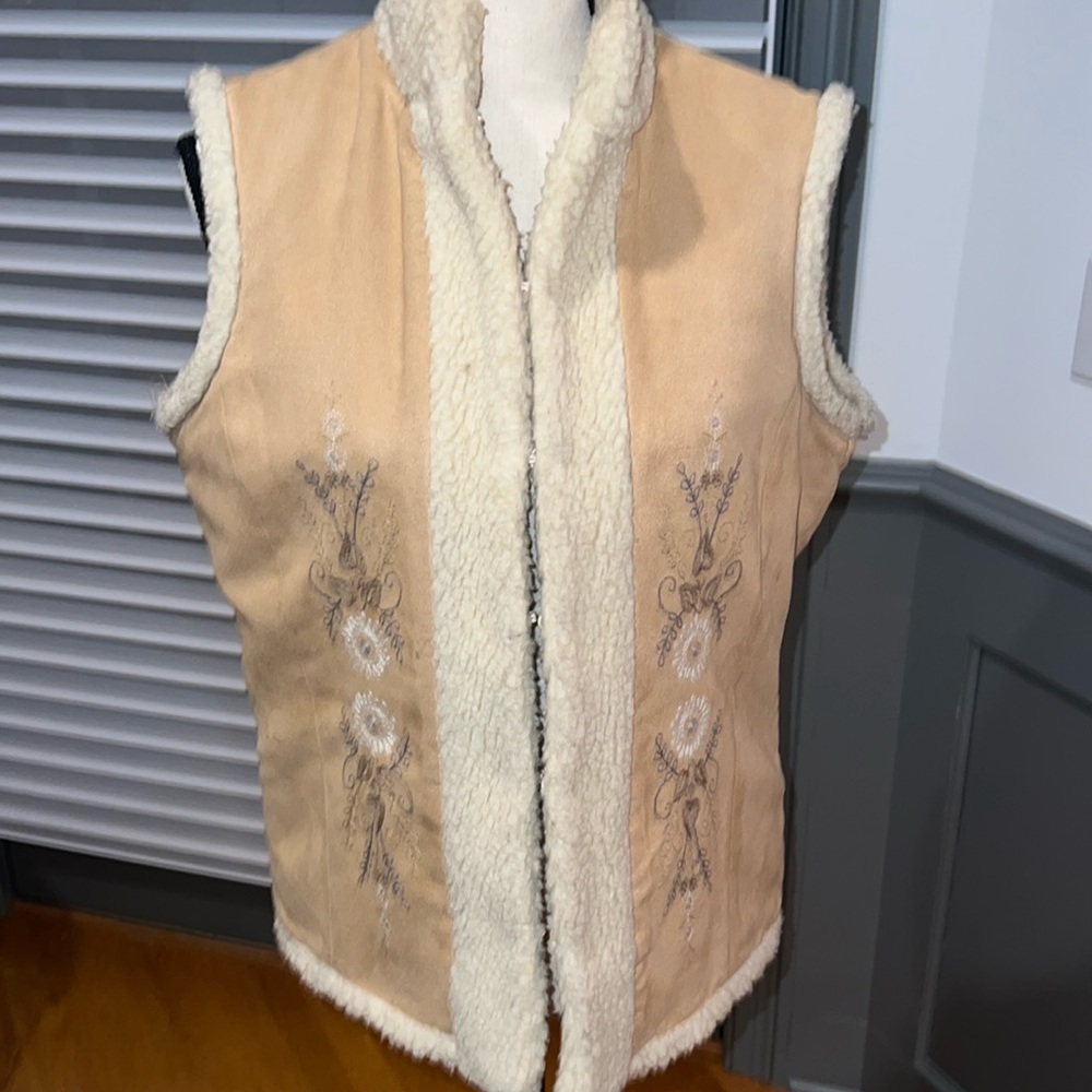 Polyester blend vest with embroidery on front